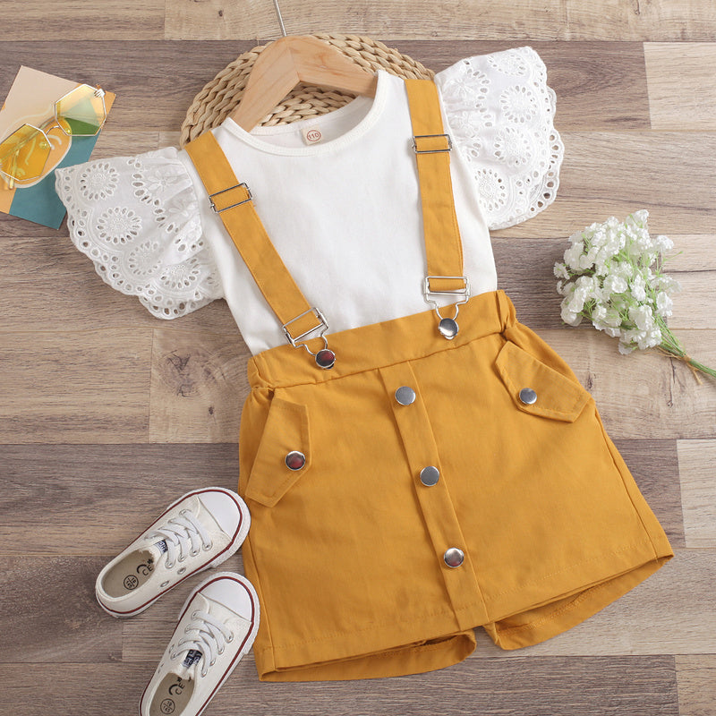 2022 European and American cross-border new children's clothing: solid color hollowed-out fly-sleeve round-neck top with detachable suspender shorts-skirt