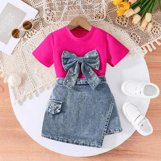 2026 European and American cross-border children's clothing set: girls' bowknot pearl T-shirt + fashionable denim skirt-pants two-piece set