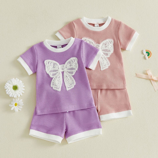 New foreign trade girls' outfit 2026 summer lace bow short-sleeve shorts simple two-piece set