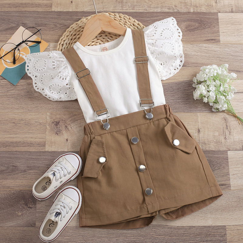 2022 European and American cross-border new children's clothing: solid color hollowed-out fly-sleeve round-neck top with detachable suspender shorts-skirt