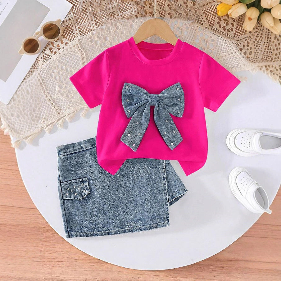 2026 European and American cross-border children's clothing set: girls' bowknot pearl T-shirt + fashionable denim skirt-pants two-piece set